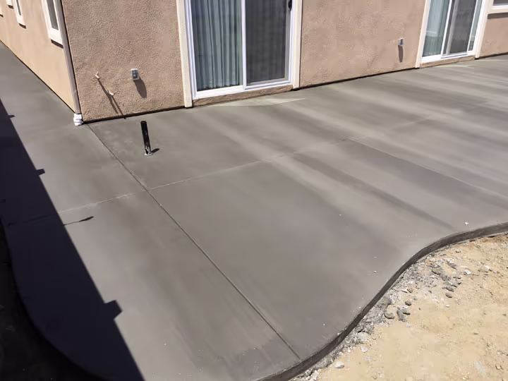Residential Concrete Flatwork Back Patio Expansion — photo 2